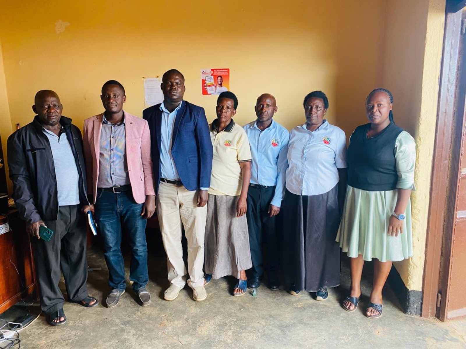 Bisheshe SACCO members and leaders at a branch